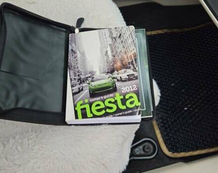 Червоний Форд Фієста, об'ємом двигуна 1.6 л та пробігом 166 тис. км за 7200 $, фото 9 на Automoto.ua