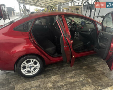 Червоний Форд Фієста, об'ємом двигуна 1.6 л та пробігом 243 тис. км за 7500 $, фото 12 на Automoto.ua