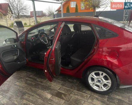 Червоний Форд Фієста, об'ємом двигуна 1.6 л та пробігом 243 тис. км за 7500 $, фото 4 на Automoto.ua