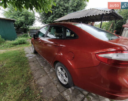Красный Форд Фиеста, объемом двигателя 1.6 л и пробегом 167 тыс. км за 7500 $, фото 6 на Automoto.ua