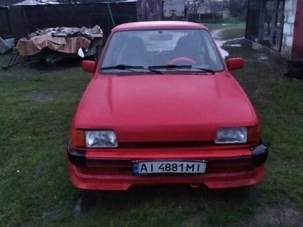 Красный Форд Фиеста, объемом двигателя 1.1 л и пробегом 100 тыс. км за 711 $, фото 1 на Automoto.ua