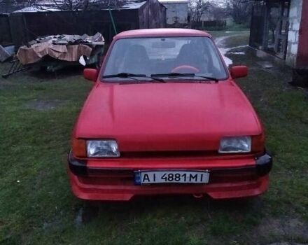 Красный Форд Фиеста, объемом двигателя 1.1 л и пробегом 100 тыс. км за 711 $, фото 1 на Automoto.ua