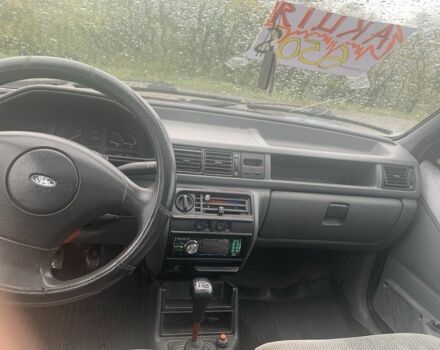 Красный Форд Фиеста, объемом двигателя 1.1 л и пробегом 156 тыс. км за 650 $, фото 1 на Automoto.ua