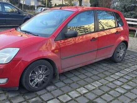 Красный Форд Фиеста, объемом двигателя 1.4 л и пробегом 260 тыс. км за 1699 $, фото 1 на Automoto.ua