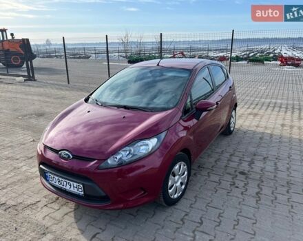 Червоний Форд Фієста, об'ємом двигуна 1.4 л та пробігом 75 тис. км за 8300 $, фото 1 на Automoto.ua