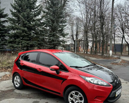 Червоний Форд Фієста, об'ємом двигуна 1.24 л та пробігом 148 тис. км за 5500 $, фото 1 на Automoto.ua