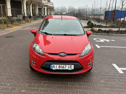 Червоний Форд Фієста, об'ємом двигуна 1.39 л та пробігом 103 тис. км за 7500 $, фото 1 на Automoto.ua