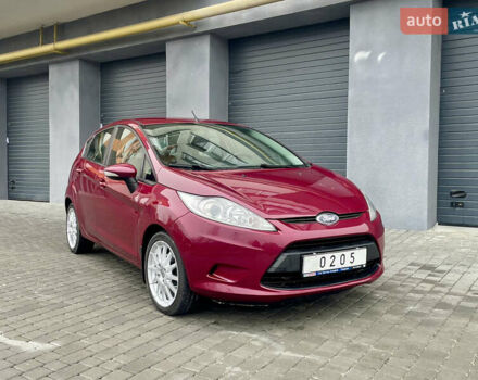 Красный Форд Фиеста, объемом двигателя 1.4 л и пробегом 119 тыс. км за 7650 $, фото 1 на Automoto.ua