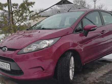 Червоний Форд Фієста, об'ємом двигуна 1.39 л та пробігом 166 тис. км за 7200 $, фото 1 на Automoto.ua