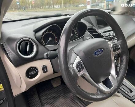 Форд Фиеста, объемом двигателя 1.6 л и пробегом 143 тыс. км за 9399 $, фото 18 на Automoto.ua
