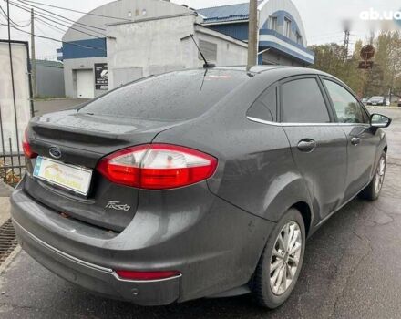 Форд Фиеста, объемом двигателя 1.6 л и пробегом 143 тыс. км за 9399 $, фото 4 на Automoto.ua