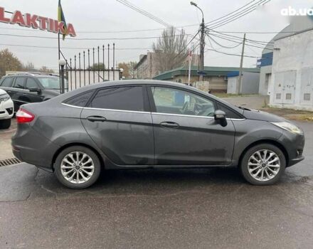 Форд Фиеста, объемом двигателя 1.6 л и пробегом 143 тыс. км за 9399 $, фото 8 на Automoto.ua