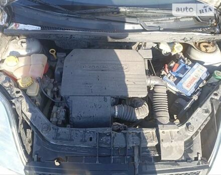 Серый Форд Фиеста, объемом двигателя 1.3 л и пробегом 172 тыс. км за 3000 $, фото 8 на Automoto.ua