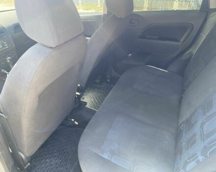 Серый Форд Фиеста, объемом двигателя 1.4 л и пробегом 250 тыс. км за 4199 $, фото 10 на Automoto.ua