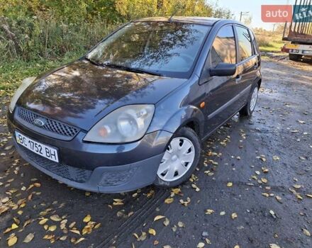 Серый Форд Фиеста, объемом двигателя 1.4 л и пробегом 203 тыс. км за 3399 $, фото 3 на Automoto.ua