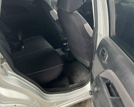 Серый Форд Фиеста, объемом двигателя 1.2 л и пробегом 194 тыс. км за 3300 $, фото 11 на Automoto.ua