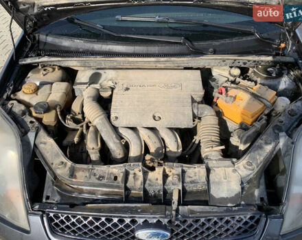 Сірий Форд Фієста, об'ємом двигуна 1.4 л та пробігом 161 тис. км за 2750 $, фото 12 на Automoto.ua