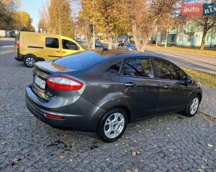 Сірий Форд Фієста, об'ємом двигуна 1.6 л та пробігом 210 тис. км за 7500 $, фото 4 на Automoto.ua