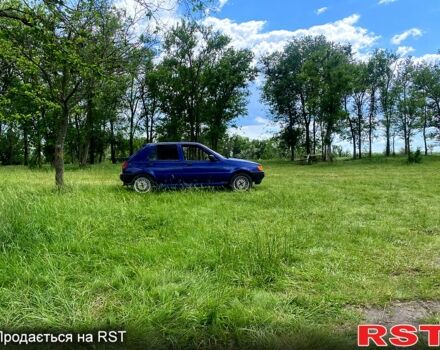 Синий Форд Фиеста, объемом двигателя 1.1 л и пробегом 200 тыс. км за 1200 $, фото 6 на Automoto.ua
