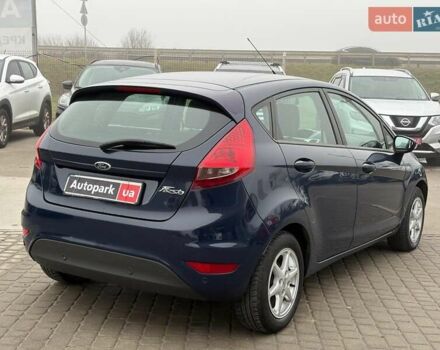 Синий Форд Фиеста, объемом двигателя 1.4 л и пробегом 240 тыс. км за 6190 $, фото 7 на Automoto.ua