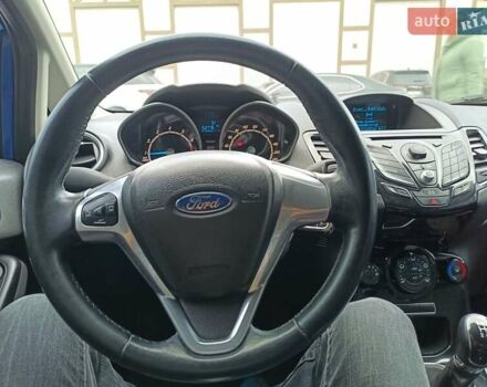 Синий Форд Фиеста, объемом двигателя 1 л и пробегом 153 тыс. км за 6499 $, фото 5 на Automoto.ua