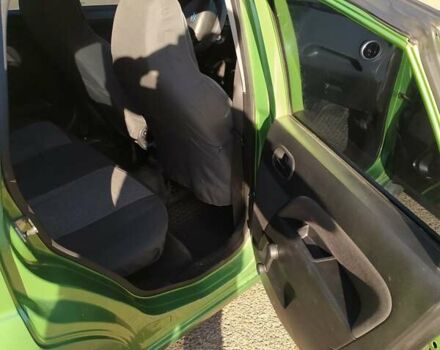 Зеленый Форд Фиеста, объемом двигателя 1.24 л и пробегом 281 тыс. км за 3950 $, фото 9 на Automoto.ua