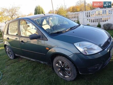 Зеленый Форд Фиеста, объемом двигателя 1.39 л и пробегом 221 тыс. км за 3300 $, фото 1 на Automoto.ua