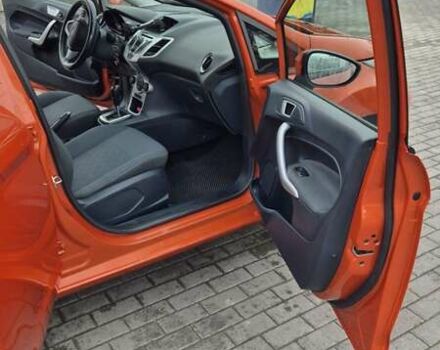 Оранжевый Форд Фиеста, объемом двигателя 1.4 л и пробегом 130 тыс. км за 6700 $, фото 17 на Automoto.ua