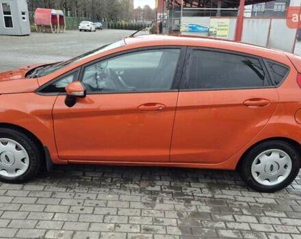 Оранжевый Форд Фиеста, объемом двигателя 1.4 л и пробегом 130 тыс. км за 6700 $, фото 5 на Automoto.ua