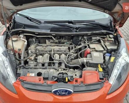Оранжевый Форд Фиеста, объемом двигателя 1.4 л и пробегом 130 тыс. км за 6700 $, фото 1 на Automoto.ua