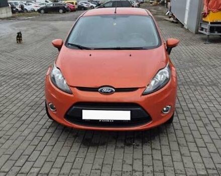 Оранжевый Форд Фиеста, объемом двигателя 1.4 л и пробегом 130 тыс. км за 6700 $, фото 4 на Automoto.ua