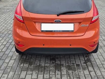 Оранжевый Форд Фиеста, объемом двигателя 1.4 л и пробегом 130 тыс. км за 6700 $, фото 1 на Automoto.ua