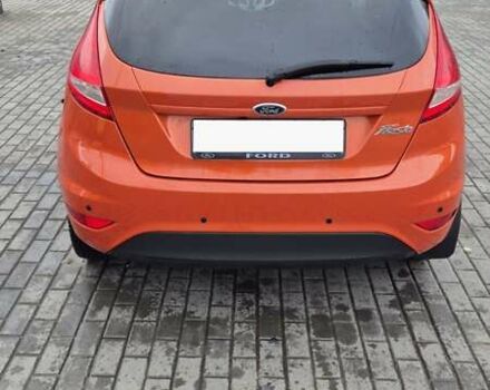 Оранжевый Форд Фиеста, объемом двигателя 1.4 л и пробегом 130 тыс. км за 6700 $, фото 1 на Automoto.ua