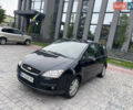 Черный Форд Focus C-Max, объемом двигателя 2 л и пробегом 285 тыс. км за 4450 $, фото 1 на Automoto.ua