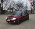 Червоний Форд Focus C-Max, об'ємом двигуна 2 л та пробігом 298 тис. км за 3750 $, фото 1 на Automoto.ua