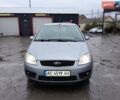 Серый Форд Focus C-Max, объемом двигателя 1.8 л и пробегом 238 тыс. км за 5000 $, фото 1 на Automoto.ua