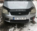 Серый Форд Focus C-Max, объемом двигателя 2 л и пробегом 300 тыс. км за 4100 $, фото 1 на Automoto.ua