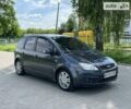 Серый Форд Focus C-Max, объемом двигателя 1.8 л и пробегом 266 тыс. км за 4250 $, фото 1 на Automoto.ua