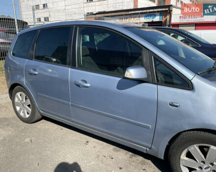 Синий Форд Focus C-Max, объемом двигателя 2 л и пробегом 260 тыс. км за 4000 $, фото 1 на Automoto.ua