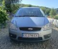 Синий Форд Focus C-Max, объемом двигателя 2 л и пробегом 321 тыс. км за 4071 $, фото 1 на Automoto.ua