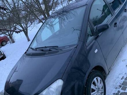 Синий Форд Focus C-Max, объемом двигателя 1.56 л и пробегом 290 тыс. км за 5100 $, фото 1 на Automoto.ua