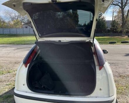 Білий Форд Фокус, об'ємом двигуна 1.4 л та пробігом 200 тис. км за 3500 $, фото 31 на Automoto.ua