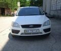 Белый Форд Фокус, объемом двигателя 1.4 л и пробегом 304 тыс. км за 3900 $, фото 2 на Automoto.ua