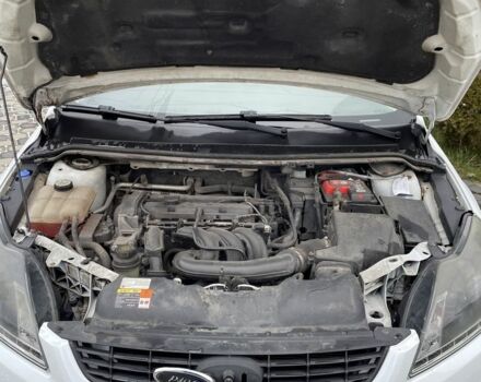 Белый Форд Фокус, объемом двигателя 1.4 л и пробегом 145 тыс. км за 4700 $, фото 7 на Automoto.ua