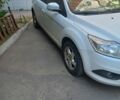 Белый Форд Фокус, объемом двигателя 1.6 л и пробегом 204 тыс. км за 6000 $, фото 1 на Automoto.ua