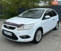Белый Форд Фокус, объемом двигателя 1.39 л и пробегом 220 тыс. км за 3900 $, фото 1 на Automoto.ua