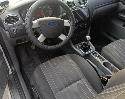 Белый Форд Фокус, объемом двигателя 1.4 л и пробегом 216 тыс. км за 3800 $, фото 2 на Automoto.ua