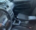 Білий Форд Фокус, об'ємом двигуна 1.4 л та пробігом 150 тис. км за 2001 $, фото 6 на Automoto.ua