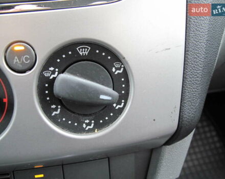 Белый Форд Фокус, объемом двигателя 1.39 л и пробегом 215 тыс. км за 5000 $, фото 58 на Automoto.ua