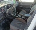 Білий Форд Фокус, об'ємом двигуна 1.6 л та пробігом 210 тис. км за 5350 $, фото 4 на Automoto.ua